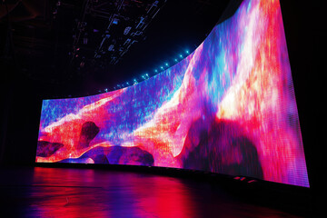 Large led projection screens. Colorful abstract background. Light show on the stage.	
