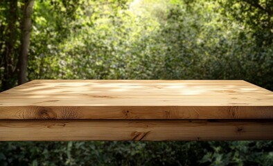 Fototapeta premium Empty wooden table against blurred green forest background.