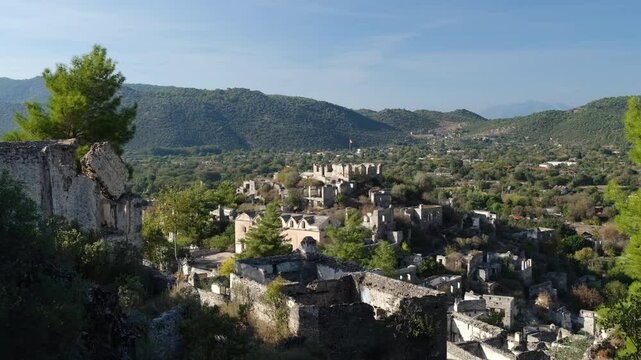 An ancient Greek village known as Kayakoy or Levissi. Historic churches and houses. A ghost town near Fethiye. Travelling in Turkey Mugla province, Turkey country - 4k video 