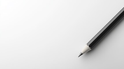 Black pencil on white background, angled to the right, ready to write.