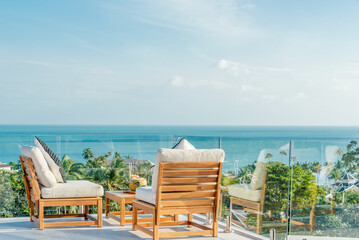 Happy vacation travel landscape, luxury beach resort hotel, swimming pool, relaxing beach chairs, palm trees, bright blue sky, summer seaside island, relaxing mood, travel, vacation, background