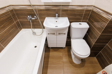 modern bathroom room with toilet and washing machine