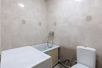 modern bathroom room with toilet and washing machine