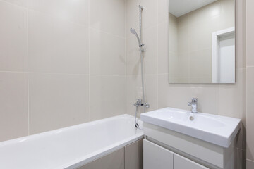 modern bathroom room with toilet and washing machine