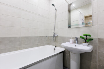 modern bathroom room with toilet and washing machine