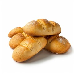 Freshly baked small bread loaves with decorative cuts, creating a visually appealing stack on a white backdrop