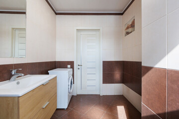 modern bathroom room with toilet and washing machine