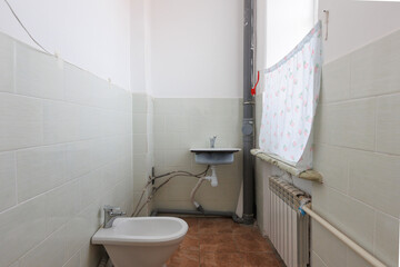 modern bathroom room with toilet and washing machine