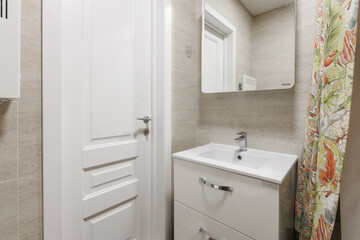 modern bathroom room with toilet and washing machine