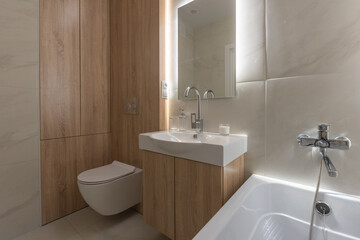 modern bathroom room with toilet and washing machine