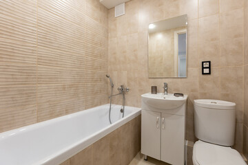 modern bathroom room with toilet and washing machine
