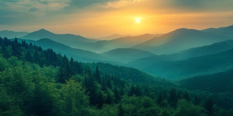 Obraz premium Mountain ridge covered in greenery at sunrise