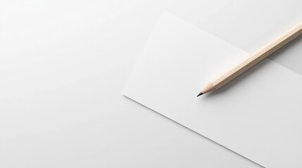 Wooden pencil on blank white paper.