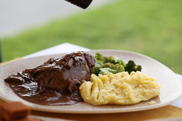 Steak with Mushroom Gravy, Mashed Potatoes, and Broccoli