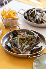  Steamed Mussels with Fresh Herbs and Fries