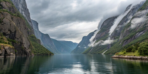 Fototapeta premium Experience the Awe-Inspiring Beauty of a Norwegian Fjord Surrounded by Majestic Mountains