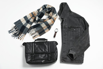 Stylish outfit with briefcase on white background, flat lay