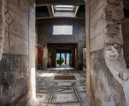 Pompei, Italy - 22 march 2024 - interior of a house with mosaic floor at the ancient Roman city