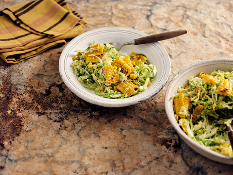 Fresh Mexican Slaw With Grilled Corn and Cabbage Served on Rustic Tableware With Vibrant Green Colors