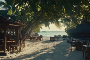 Serene Beachside Cafe Under Arching Tree Canopy in Early Morning Light with Rustic Tables and Chairs Perfect for Relaxation and Dining Experience