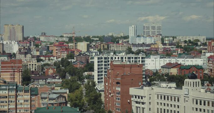 Cityscape overlooking on cloudy summer day