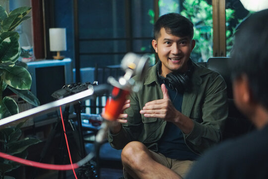 Hosting a podcast where you chat with guests in a fun and natural way at your home studio.