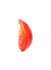 Slice of cherry tomato isolated on white