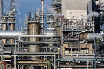 Part of refinery facility with complicated pipe system