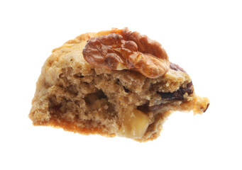 Piece of tasty cookie with nuts isolated on white