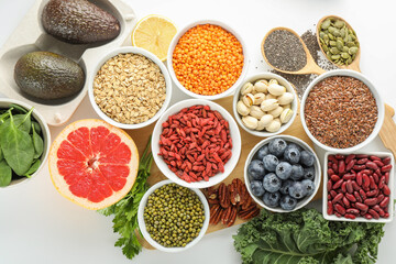 Superfood. Different healthy food products on white background, flat lay