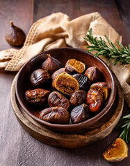 Dried Figs and Chestnuts Autumn Harvest, Rustic Bowl, Wooden Table, Generated image