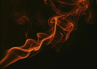 Obraz premium Abstract fiery orange and red flames on black background