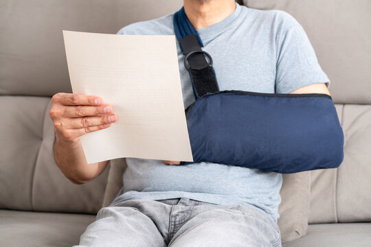 Reading letter about Injury and compensation paperwork, insurance, legal contract or lawyer consulting.Disability people, attorney or advocate in negotiation,policy advice or accident report closeup