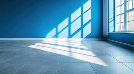 Obraz premium Bright Blue Wall with Sunlight Shadows on Light Gray Floor