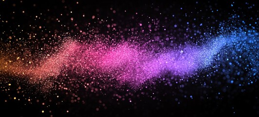 Obraz premium Colorful glitter particles swirl on black background.