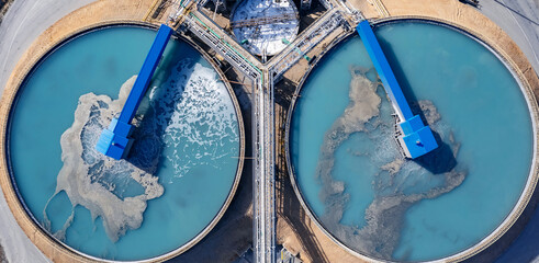 Water treatment facility at copper mine factory and processing plant, aerial top view