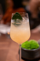 A glass of cocktail on the table