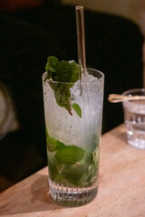 A glass of Mojito on the table