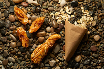 Still life of baklava, cheese and pumpkin sevens