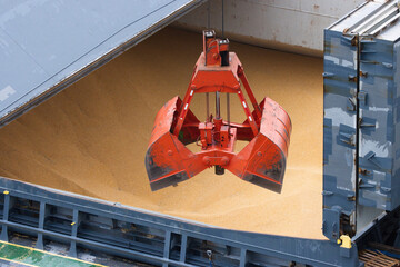 grain being unloaded from a bulk carrier cargo ship 