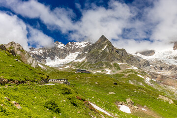 Val Veny mountain landscape in Courmayeur, italian Alps on Tour du Mont Blanc hiking route TMB. Trekking and hiking in the Alps among beautiful landscape and stunning scenery of the Alps green valleys