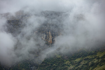 Misty mountain landscape in Nassfelder Tal, Salzburg, reflecting tranquil nature's beauty