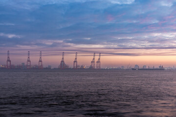 Loading cranes at commercial port at Liverpool
