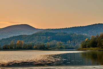 Lake after sunset. With small ripples on the water surface. Autumn landscape. Nosice, Puchov Slovakia