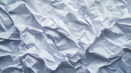 Obraz premium Crumpled white paper creates an interesting texture on a gray background, showcasing the unique qualities of empty white crumpled paper in a visually appealing manner.