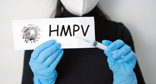 HMPV Doctor showing syringe and hmpv sign for human metapneumovirus