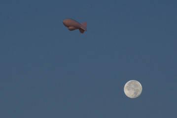592  Full Moon with Tethered Aerostat Radar System (TARS) 

A US Customs and Border Protection Aerostat Radar Site located on Fort Huachuca near Sierra Vista, Cochise County, Arizona. 