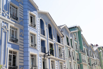 Obraz premium Blue color modern exterior of Houses Buildings facade. Bright architecture street travel