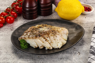 Baked cod fish fillet with spices