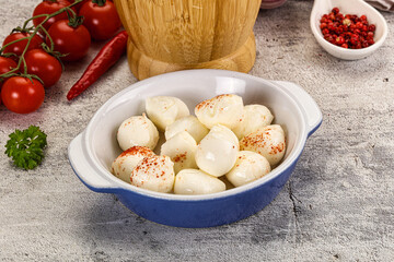 Mozzarella balls cheese in the bowl